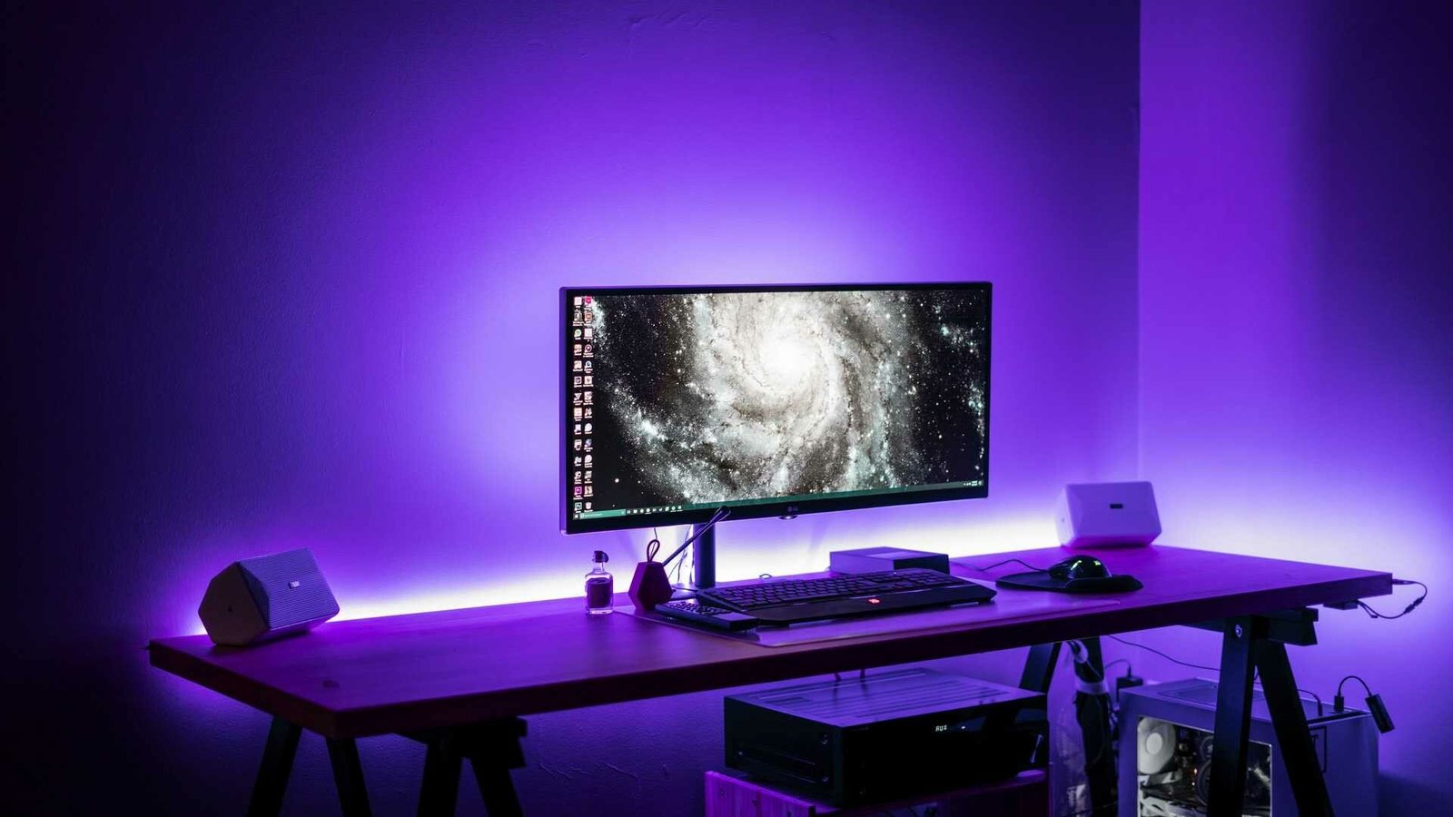 gaming desk with purple lighting